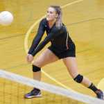 Photo by Jeff Helminiak/Peninsula Clarion Kenai Central's Abby Beck digs the ball Saturday in Nikiski in the final of the ninth annual Shayna Pritchard Memorial Volleyball Tournament.