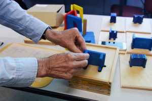 Photo by Megan Pacer/Peninsula Clarion Jordana Engebresten, teacher for visually impaired and blind students for the Kenai Peninsula School District, explores the transfograf, a tool developed to help blind students understand how objects are transfered to drawings, during a workshop Tuesday, Sept. 1, 2016 at Soldotna Prep in Soldotna, Alaska. The tool, along with several others, was developed by Boguslaw "Bob" Marek, a professor of English from Poland who shared the resources in Anchorage and Soldotna this month.