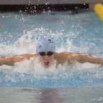 Photo by Joey Klecka/Peninsula Clarion Soldotna's Cody Watkins competes in the 100-yard butterfly Saturday at the state swimming and diving meet at Bartlett High School in Anchorage.