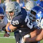 By Joey Klecka/Peninsula Clarion Soldotna running back Austin Schrader (20) rumbled up the middle for a gain Friday evening against Palmer at Justin Maile Field in Soldotna.