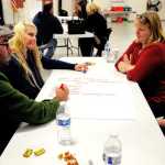 Photo by Elizabeth Earl/Peninsula Clarion Attendees at the Kenai Peninsula Journey Home's workshop on homelessness write down ideas for what resources are currently available to homeless individuals on the central Kenai Peninsula on Wednesday, Sept. 14, 2016 in Kenai, Alaska. Organizers for the Kenai Peninsula Journey Home, a local group working to combat homelessness, plan to seek nonprofit status.