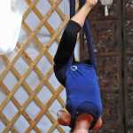 Photo by Elizabeth Earl/Peninsula Clarion A participant strikes a pose during an aerial yoga session at the Yoga Yurt on Monday, Sept. 12, 2016 near Soldotna, Alaska. The Yoga Yurt, a new yoga studio on Kalifornsky Beach Road near the intersection of Poppy Lane, opened this summer, offering aerial and paddleboard yoga as well as more traditional mat yoga classes.