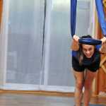 Photo by Elizabeth Earl/Peninsula Clarion A participant strikes a pose during an aerial yoga session at the Yoga Yurt on Monday, Sept. 12, 2016 near Soldotna, Alaska. The Yoga Yurt, a new yoga studio on Kalifornsky Beach Road near the intersection of Poppy Lane, opened this summer, offering aerial and paddleboard yoga as well as more traditional mat yoga classes.