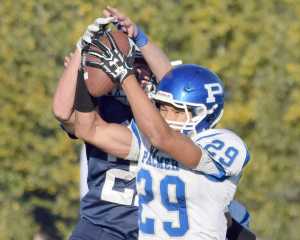 Photo by Joey Klecka/Peninsula Clarion Palmer defensive back Jared Oviok (29) intercepts a pass against Soldotna in a Northern Lights Conference game Sept. 9 at Justin Maile Field. Palmer and Kenai Central will clash tonight in a crucial matchup.