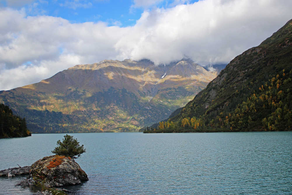 Ben Boettger/Peninsula Clarion Clouds float over Grant Lake, the proposed water source for Homer Electric Association's Grant Lake Hydroelectric project, on Sunday, Sept. 18 near Moose Pass.