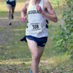 Photo by Jeff Helminiak/Peninsula Clarion Kodiak's Keith Osowski widens the lead on Colony's Tracen Knopp with a little over a kilometer to go in the Class 4A boys race at the Region III meet at Tsalteshi Trails. Osowski would finish first, while Knopp was second.