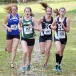Photo by Jeff Helminiak/Peninsula Clarion Palmer's Ruby Woodings, Colony's Jill Bowker and Kenai Central's Riana Boonstra and Jaycie Calvert make up the lead pack a little over a kilometer from the finish in the Class 4A girls race at the Region III meet at Tsalteshi Trails. Woodings won the race, and Boonstra and Calvert led the Kardinals to the team title.