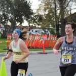 Photo by Elizabeth Earl/Peninsula Clarion Joanna Riley of Homer heads down the home stretch of her half-marathon run in the Kenai River Marathon on Sunday, Sept. 25, 2016 in Kenai, Alaska.
