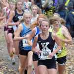 Photo by Joey Klecka/Peninsula Clarion Kenai Central junior Riana Boonstra (600) leads a pack of runners in the 4A girls race Saturay afternoon on the Bartlett High School trails.