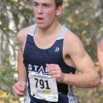 Photo by Joey Klecka/Peninsula Clarion Soldotna's Koby Vinson eyes the pack early in Saturday's 4A boys race on the Bartlett High School trails in Anchorage.