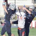 Photo by Joey Klecka/Peninsula Clarion Soldotna cornerback Jace Urban (9) intercepts a pass from North Pole quarterback Craig Borba late in Saturday's medium-schools semifinal at Palmer High School.