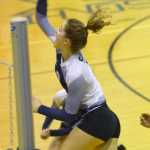 Photo by Jeff Helminiak/Peninsula Clarion Ella Stenga attacks against Colony on Wednesday at Soldotna High School.