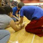 Photo by Megan Pacer/Peninsula Clarion Students on team Cheese Wheelers prepare their homemade mouse trap vehicle for takeoff during the annual Mind A-Mazes competition Saturday, Oct. 15, 2016 at Soldotna Prep in Soldotna, Alaska. Each of this year's 44 teams from across the school district had about six weeks to design and build their devices before going head to head in the event facilitated by the district's Quest Program.