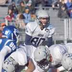 Photo by Joey Klecka/Peninsula Clarion Soldotna freshman Jersey Truesdell (80) gives orders to his linemen in the first quarter of Saturday's medium-schools state championship game against Palmer at Palmer High School.