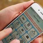 Photo by Ben Boettger/Peninsula Clarion A new phone app called Time of Need, pictured in use Tuesday, Oct. 18, 2016 in Kenai, Alaska, collects informtion on resources that would be helpful to those who are homeless or near homeless and organizes them in order of proximity to the user. Launched earlier this year, the app uses very little data and can also be used offline. A version of the app for Android phones is future a goal of its creators.