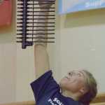 Photo by Joey Klecka/Peninsula Clarion Soldotna senior Annie Quinn makes her mark in the vertical challenge Wednesday night at Kenai Central High School.