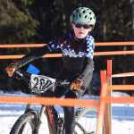 Photo by Joey Klecka/Peninsula Clarion Landon Showalter rounds the tape Saturday afternoon on the Tsalteshi Trails.