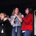 Photo by Elizabeth Earl/Peninsula Clarion Donald Trump (Tyler Payment, left) and Hillary Clinton (Hannah Tauriainen, right) harass a Millennial voter (Delana Duncan Green) for her support during a dress rehearsal for Triumvirate Theatre's "Lame Ducks and Dark Horses" political satire play Monday, Oct. 24, 2016 near Kenai, Alaska.