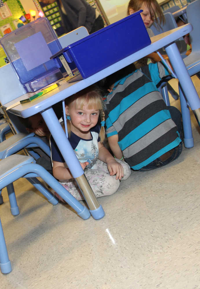 Kids drop,cover and hold
