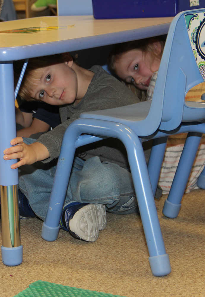 Kids drop,cover and hold