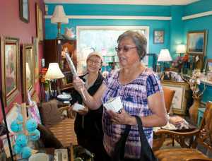 Photo courtesy Kenaitze Indian Tribe In this Aug. 23, 2016, Nancy Nelson (left) and Laura Hobson look at antiques in a curio store during a shopping trip the two women shared in Kenai, Alaska. Both are participating in the Kenaitze Indian Tribe's Senior Companion Program.