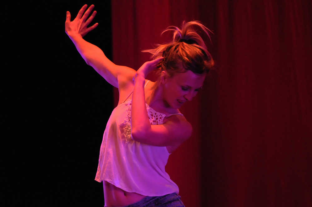 Photo by Elizabeth Earl/Peninsula Clarion A dancer from Peninsula Artists in Motion, a central Kenai Peninsula dance group, rehearses Wednesday, Nov. 2, 2016 at Kenai Central High School in Kenai, Alaska. The group will perform Friday, Nov. 4, 2016 at the high school at 7 p.m. to mark its 15th anniversary.