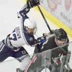 Photo by Joey Klecka/Peninsula Clarion Soldotna defender Ethan Brown (13) makes a move on Houston forward Trace Merrigan Thursday night at the Soldotna Regional Sports Complex.