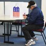 Photo by Megan Pacer/Peninsula Clarion Nikiski resident Richard Marquez casts his vote Tuesday, Nov. 8, 2016 at the North Peninsula Recreation Center in Nikiski, Alaska.