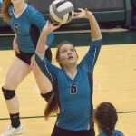 Photo by Joey Klecka/Peninsula Clarion Nikiski's Emma Wik (6) sets up a pass against Mt. Edgecumbe Friday evening at the Class 3A state volleyball tournament at the Alaska Airlines Arena in Anchorage.
