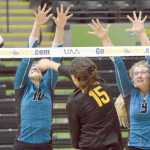 Photo by Joey Klecka/Peninsula Clarion Nikiski's Ayla Pitt (10) and Jamie Yerkes team up to block a shot by Mt. Edgecumbe hitter Haylee Steffes (15) Friday evening at the Class 3A state volleyball tournament held at the Alaska Airlines Arena in Anchorage.