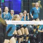 Photo by Joey Klecka/Peninsula Clarion Nikiski's Kaitlyn Johnson (8) jumps up in excitement along with the Nikiski bench Friday evening at the Class 3A state volleyball tournament at the Alaska Airlines Arena in Anchorage.