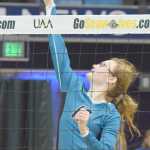 Photo by Joey Klecka/Peninsula Clarion Nikiski's Melanie Sexton sends a ball over the netting against Mt. Edgecumbe, Friday evening at the Class 3A state volleyball tournament held at the Alaska Airlines Arena in Anchorage.