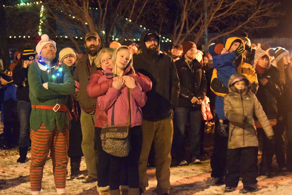 Photo by Megan Pacer/Peninsula Clarion Fireworks light up the sky during the finale of the annual Christmas Comes to Kenai celebration Friday, Nov. 25, 2016 at the Kenai Chamber of Commerce and Visitor Center in Kenai, Alaska.