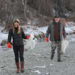 Soldotna Rotarians clear debris at handicap accessible Rotary Park.