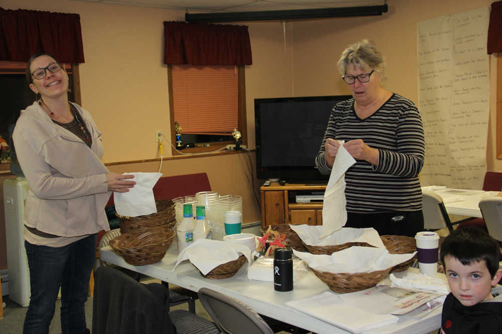 Families work together to be sure everyone has a Happy Thanksgiving dinner.
