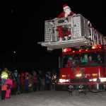 St. Nick up on the firetruck