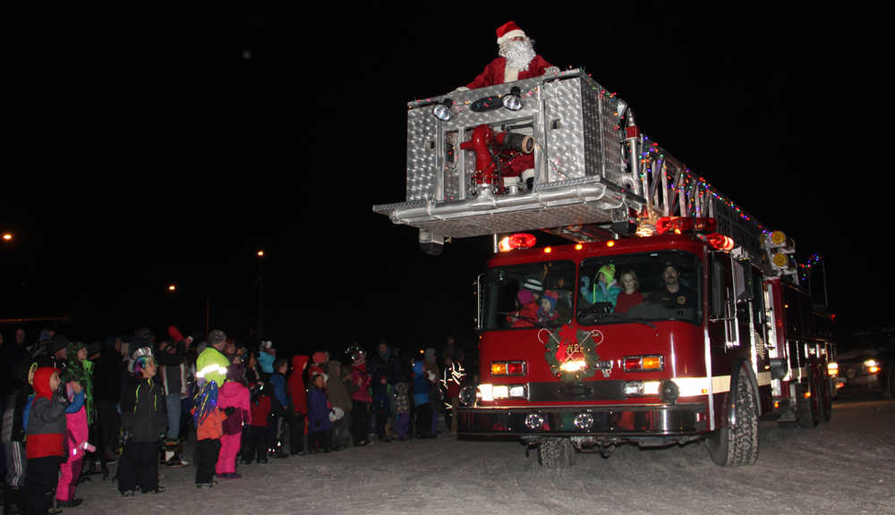 St. Nick up on the firetruck