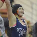 Photo by Joey Klecka/Peninsula Clarion Vydell Baker of Soldotna is crowned the 132-pound girls champion Saturday at the Northern Lights Conference tournament at Kenai Central High School.