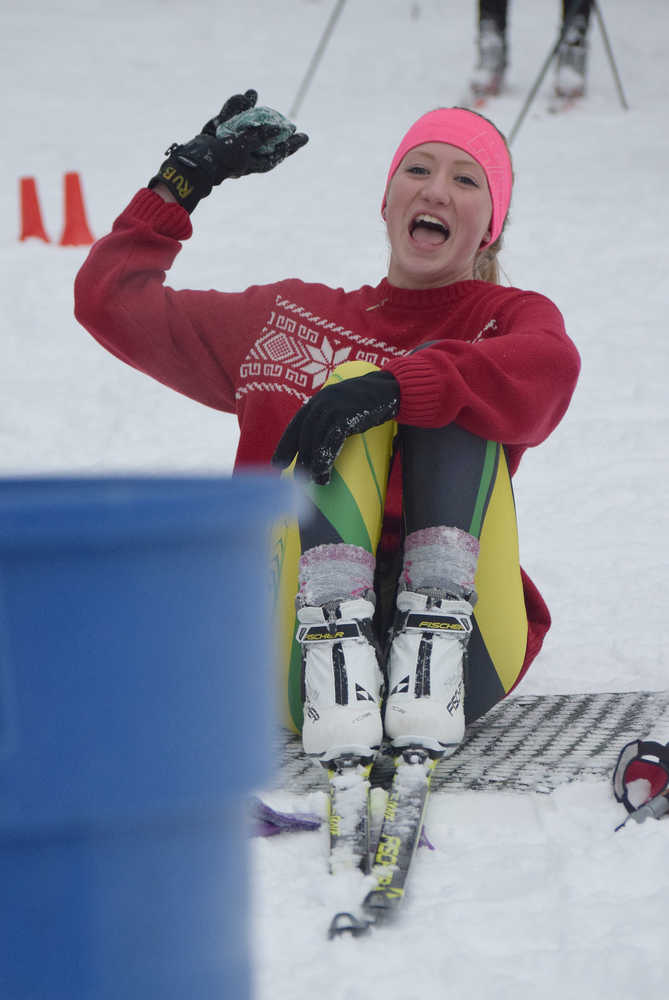 Photo by Joey Klecka/Peninsula Clarion Seward racer Ruby Lindquist takes aim at her target with a bean bag, Friday afternoon at the Tsalteshi ski trails in Soldotna.