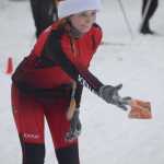 Photo by Joey Klecka/Peninsula Clarion Kenai Central skier Veronika Budyanu throws her bean bag at the targeted waste bin Friday afternoon at the Tsalteshi ski trails in Soldotna.