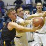 Photo by Jeff Helminiak/Peninsula Clarion Ninilchik's Dalton Geppert and Soldotna's Sam McElroy battle for the ball Friday at Soldotna High School.