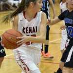 Photo by Jeff Helminiak/Peninsula Clarion Kenai Central's Brooke Satathite looks for an opening Friday against Thunder Mountain at Kenai Central High School. Satathite had a game-high 23 points.