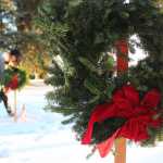 Photo by Megan Pacer/Peninsula Clarion From left to right: Joe Coup, Greg Fite and Ray Nickelson fire shots just before taps is played at a wreath-laying ceremony Saturday, Dec. 17, 2016 at the Kenai Municipal Cemetery in Kenai, Alaska. Bob Myles, a member of the VFW and American Legion, coordinated the peninsula's first wreath ceremony through the Wreaths Across America program. Community members hung wreaths on the graves of veterans in the Kenai and Soldotna cemeteries, and Myles is working to expand the event to more peninsula cemeteries next year.