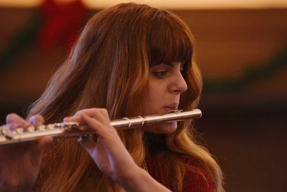 Photo by Ben Boettger/Peninsula Clarion Sean Raften performs in a violin ensemble with his teacher Ida Pearson and other students in a flute and violin concert on Saturday, Dec. 17 at Christ Lutheran Church in Soldotna.