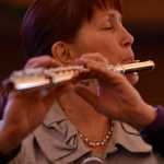 Photo by Ben Boettger/Peninsula Clarion Katie Stoll prepares for a solo flute piece in a flute and violin concert on Saturday, Dec. 17 at Christ Lutheran Church in Soldotna. The free concert featured the students of flautist Tomoka Raften and violinist Ida Pearson.