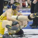 Photo by Joey Klecka/Peninsula Clarion Homer senior Timmy Woo battles with Glennallen's Caden Gerlach in the 160-pound final of the Class 1-2-3A state wrestling championships Saturday night at the Alaska Airlines Center in Anchorage.
