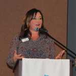 Devon Thomas of the Alaska Association of Realtors addresses Kenai Peninsula Association of Realtors members.