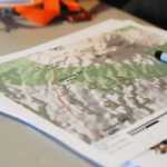 Photo by Elizabeth Earl/Peninsula Clarion A map that outlines the route that Chris Walden and his daughter Avery, 9, will take to summit Mt. Kilimanjaro sits on a table in the Waldens' home on Sunday, Dec. 18, 2016 near Soldotna, Alaska. Avery and Chris Walden, along with a family friend, will embark on an eight-day expedition to summit Mt. Kilimanjaro starting Dec. 31. If they succeed, Avery Walden will be the youngest female ever to summit the 19,341-foot mountain.