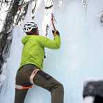 Photo by Elizabeth Earl/Peninsula Clarion Chris Walden demonstrates an ice climbing technique on the ice wall he set up in the back yard of his family's home on Sunday, Dec. 18, 2016 near Soldotna, Alaska. To build the ice wall, he set up a drip system with a PVC pipe between two trees with hanging pieces of twine to allow the ice to build up, and with the deep-freeze temperatures that hit the Kenai in early December, he soon had an ice wall multiple feet thick. Walden and his daughter Avery, 9, along with a family friend, will embark on an eight-day expedition to summit Mt. Kilimanjaro in Tanzania. If they succeed, Avery Walden will be the youngest female ever to summit the 19,341-foot mountain.