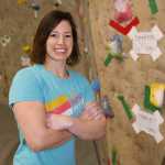 ADVANCE FOR RELEASE SATURDAY, DEC. 17, 2016 AND THEREAFTER - In this Dec. 8, 2016 photo, Emily Mengershausen poses for photos at Ascension Rock Club in Fairbanks, Alaska. Mengershausen, one of Fairbanks' premier climbing instructors, taught herself to climb and started competing after she was injured as a young gymnast. (Eric Engman/Fairbanks Daily News-Miner via AP)